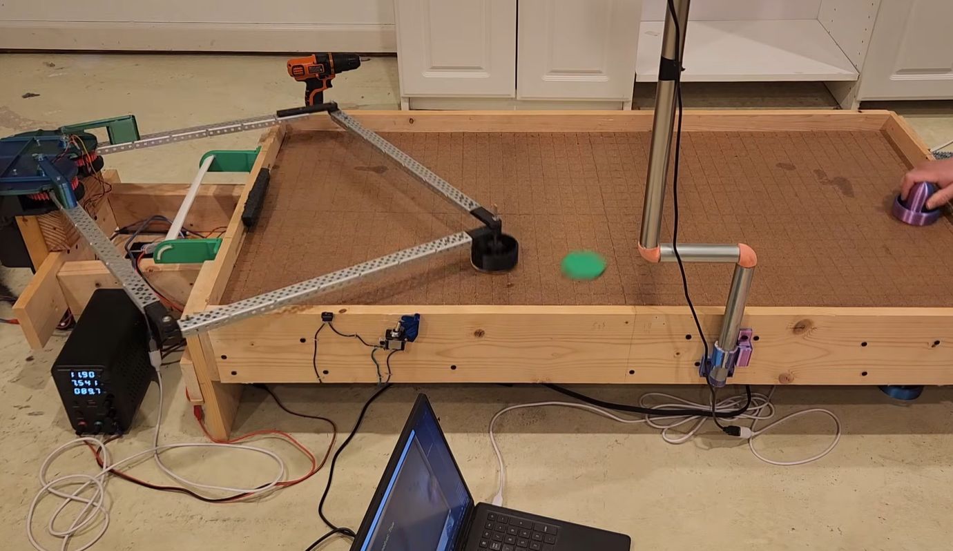 Building a Robot Partner to Play Air Hockey With
