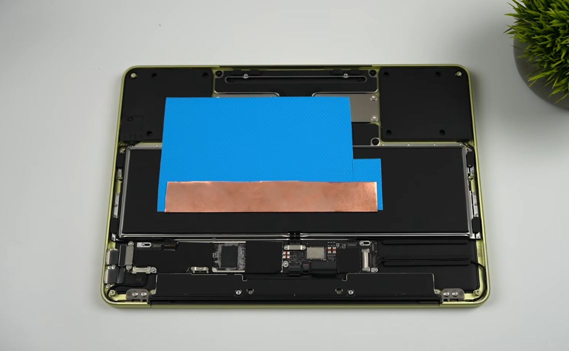Water Cooling the MacBook Neo Laptop to Double Gaming Performance