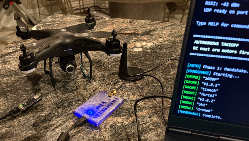 A laptop communicating with the drone via an Arduino