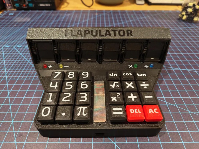 A 3D-printed, split-flap display-having calculator with a Raspberry Pi Pico inside.