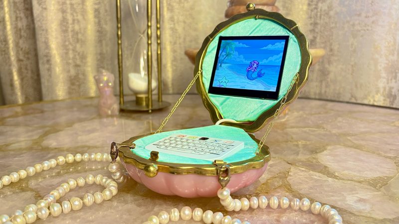 The clutch-purse cyberdeck, complete with pearls for the chain.