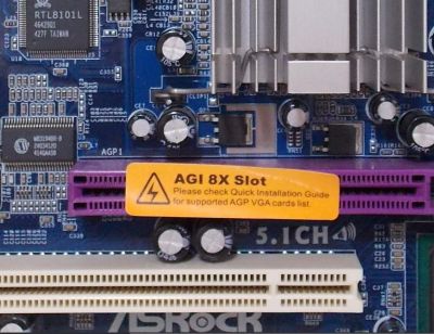 Warning on fake AGP slot on genuine Asrock mainboard. (Credit: The Retro Web)