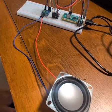 A Raspberry Pi Pico 2 W connected to a speaker