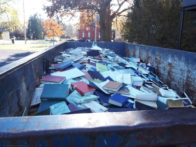 A dumpster full of books