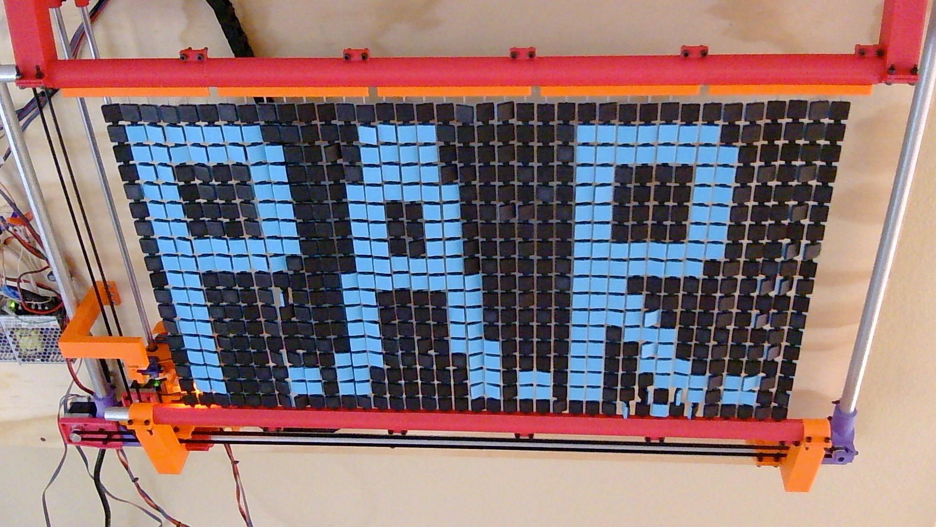 A Flip Disc Display That Does It Slow And Steady