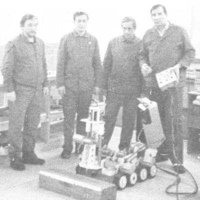 Researchers of the ISP NPP next to one of the TR robots. (Credit: ISP NPP)