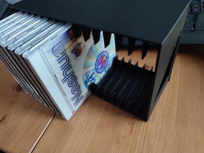 The FDM version of the CD rack in black PLA passing QA. (Credit: Maya Posch)