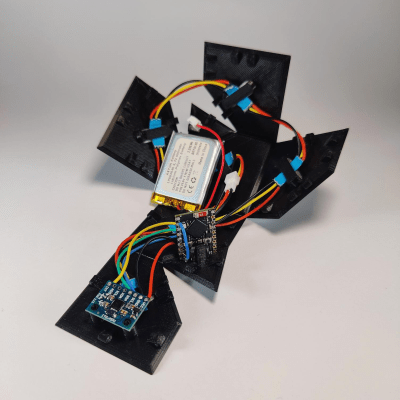 The guts of FlipBuddy inside the unfurled enclosure.