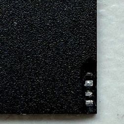 Tiny capacitors in an SD card package. (Credit: Aeson Labs)