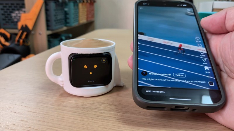 The virtual pet showing a distressed face while a phone is in use