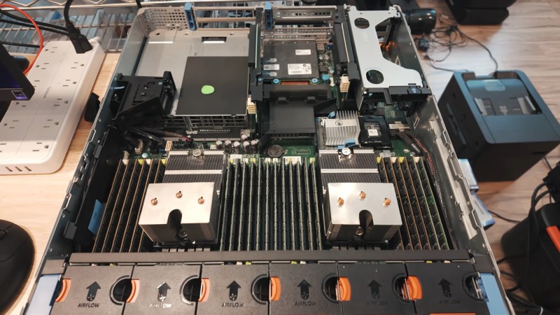 The guts of the server, with lots of sticks of DDR3, and not a single GPU in sight.