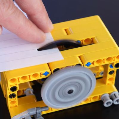 The all-LEGO version barely cuts paper. (Credit: Jamie's Brick Jams, YouTube)