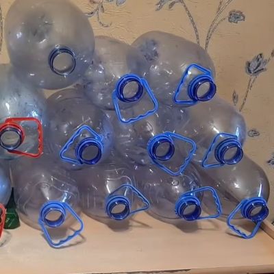 The heat-smoothed water bottles, ready for cutting.